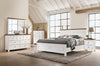 Westconi King Panel Bed with Mirrored Dresser, Chest and Nightstand